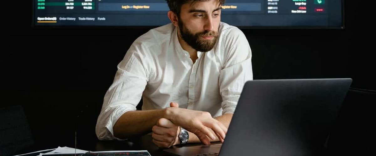 Man Researching on Computer